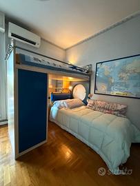 letto a castello con struttura a elle