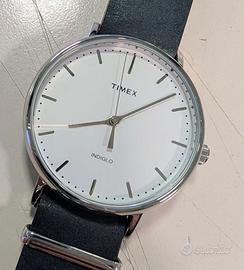 orologio della Timex retroilluminato green