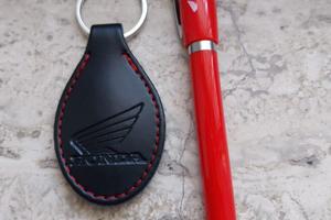 Portachiavi e penna Honda