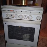 cucina Ariston 4 fuochi e forno elettrico 