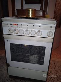 cucina Ariston 4 fuochi e forno elettrico 
