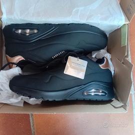 Skechers nere Street Uno Golden Black Air
