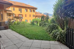 Appartamento in centro con box e giardino privato
