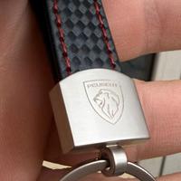 Portachiavi in pelle Peugeot con cuciture rosse