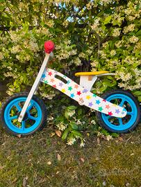 bicicletta senza pedali in legno