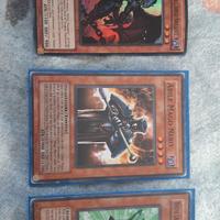 
3 carte yu-gi-oh! abile mago nero,draghi pokemon