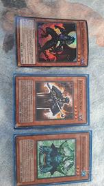 
3 carte yu-gi-oh! abile mago nero,draghi pokemon