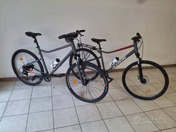 Coppia bicicletta trekking uomo donna
