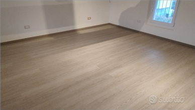 Posatore pavimenti laminato