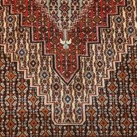 TAPPETO  INTERAMENTE INTRECCIATO A MANO