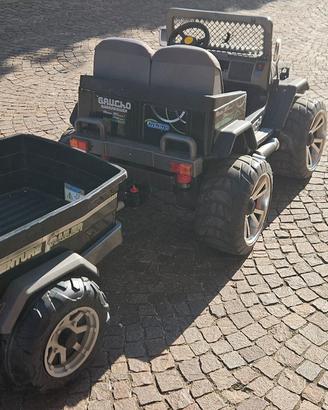 Gaucho Peg Perego 24v con rimorchio