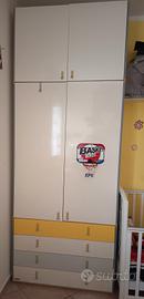 armadio 4 ante e 4 cassetti 