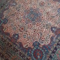 tappeto persiano intrecciato a mano