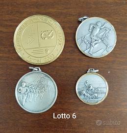 Lotto di medaglie a tema sportivo come da foto 