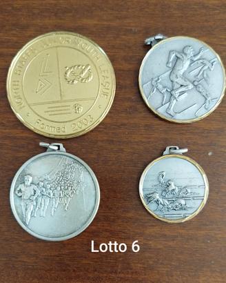 Lotto di medaglie a tema sportivo come da foto 