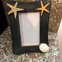 Cornice foto mare conchiglia e stelle marine