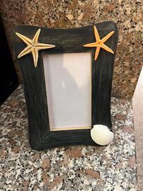 Cornice foto mare conchiglia e stelle marine