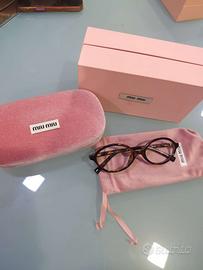 Occhili miu miu