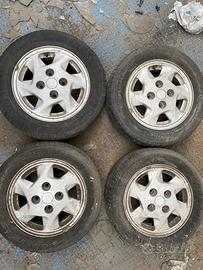 4 Cerchi in lega 14” 4 fori anni 80/90