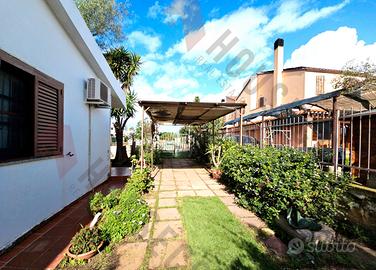 Villetta con giardino su 4 lati