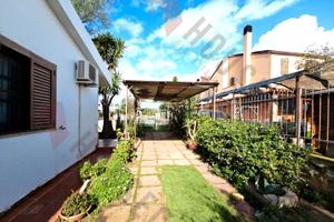 Villetta con giardino su 4 lati