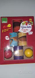 gioco scatole metallo e palline di Vilac
