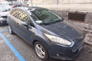 Ford fiesta camb. Automat .prezzo è compreso pass.