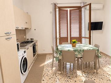 Bilocale con terrazzo attrezzato - uso transitorio