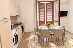 Bilocale con terrazzo attrezzato - uso transitorio