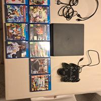 playstation 4 con giochi e cavi