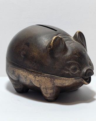 Vecchio salvadanaio a forma di maialino in bronzo