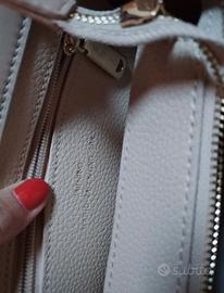 Borsa e portafoglio Valentino