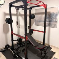 Rack professionale + dischi pesi + manubri.