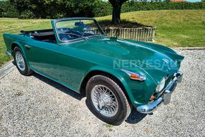 Triumph TR4 IRS Verde inglese | 1966 ASI Guida sin