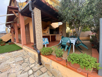 Villasimius, trilocale con giardino e posto auto