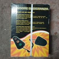 Sensore di distanza per box auto