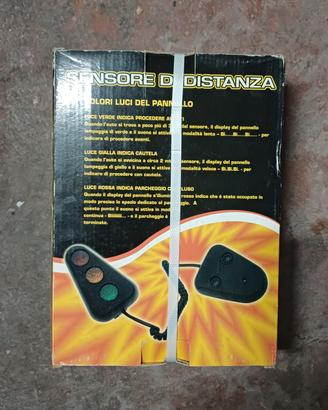 Sensore di distanza per box auto