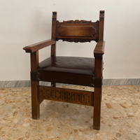 Poltrona trono antico in legno scolpito e cuoio