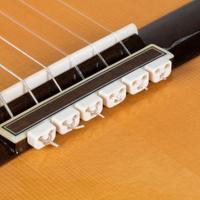 Ferma corda al pnte per chitarre classiche