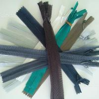 Cerniere lampo invisibili per abbigliamento etc