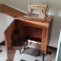 Macchina da cucire vintage Singer modello 297