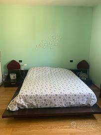 letto  matrimoniale con comodini e cassetti