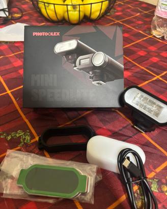 Photoolex mini speedlite