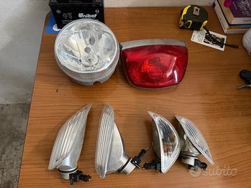 Faro e frecce originali  per Vespa LX 125