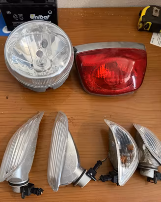 Faro e frecce originali  per Vespa LX 125