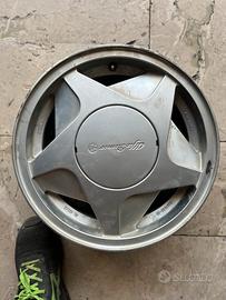 4 cerchi alfa romeo + 1 di scorta