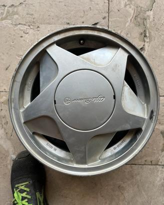 4 cerchi alfa romeo + 1 di scorta