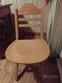 Quattro sedie pieghevoli in legno