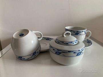 Set da thè con due tazze, piattini e zuccheriera