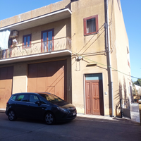 Casa singola con grande garage